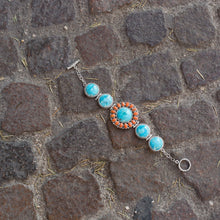 7.5" Reconstituted Turquoise and Coral Sunburst Toggle Bracelet